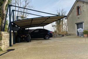 une démonstration du savoir-faire d'anavi avec un carport aluminium sur mesure à genlis.